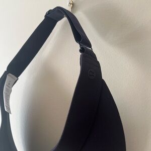LULULEMON black visor. Never worn ever. Completely new.